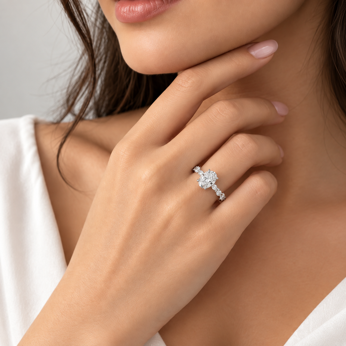 Oval-Cut Diamond Engagement Ring with Marquise and Round Accents